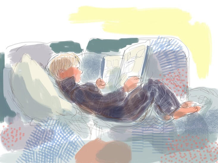 Charlie reading Beano. iPad